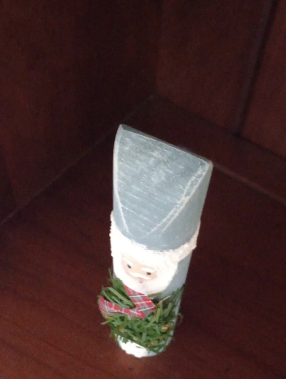 Handcrafted Powder Blue Wood Santa Holiday Figurine with Green Wreath